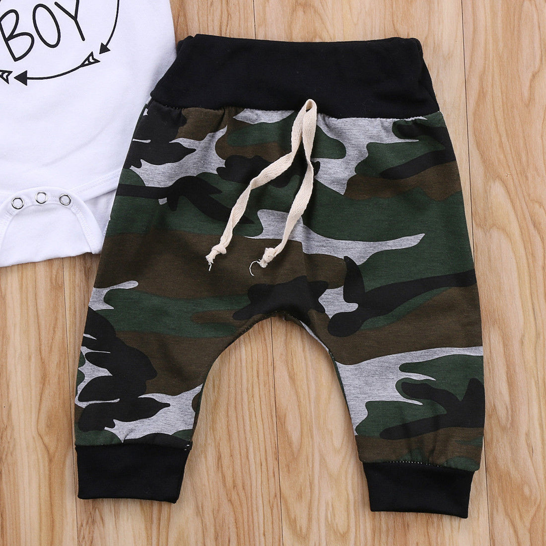 Camouflage trousers + white letters